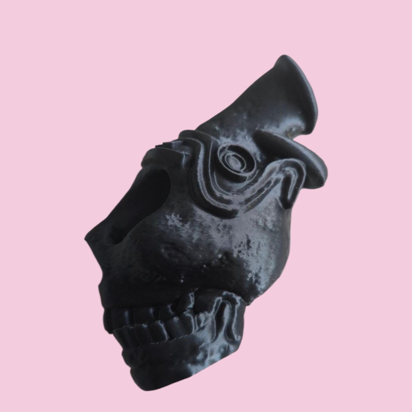 Blow the bone-chilling scream of the ancients. This handcrafted Aztec death whistle delivers a terrifying sound. A unique gift, replica, or tribal decor piece.