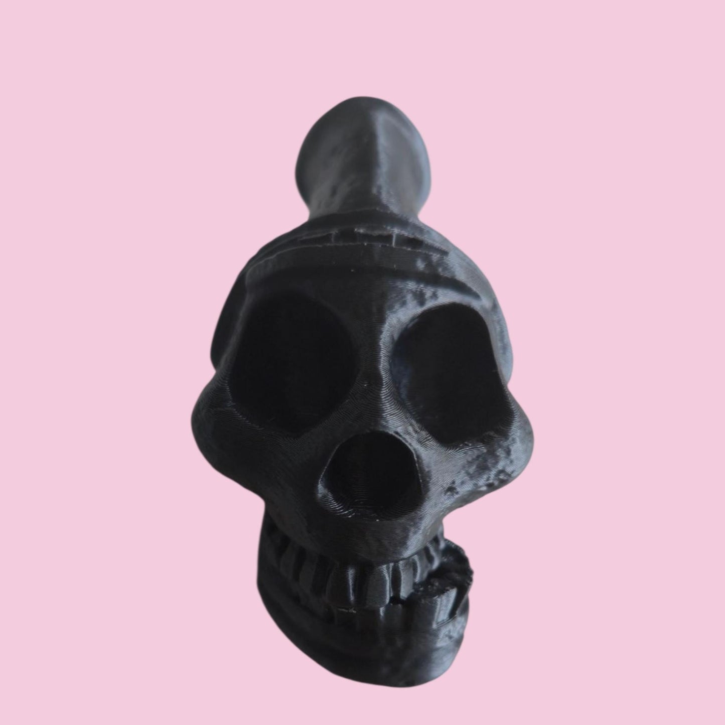 Blow the bone-chilling scream of the ancients. This handcrafted Aztec death whistle delivers a terrifying sound. A unique gift, replica, or tribal decor piece.