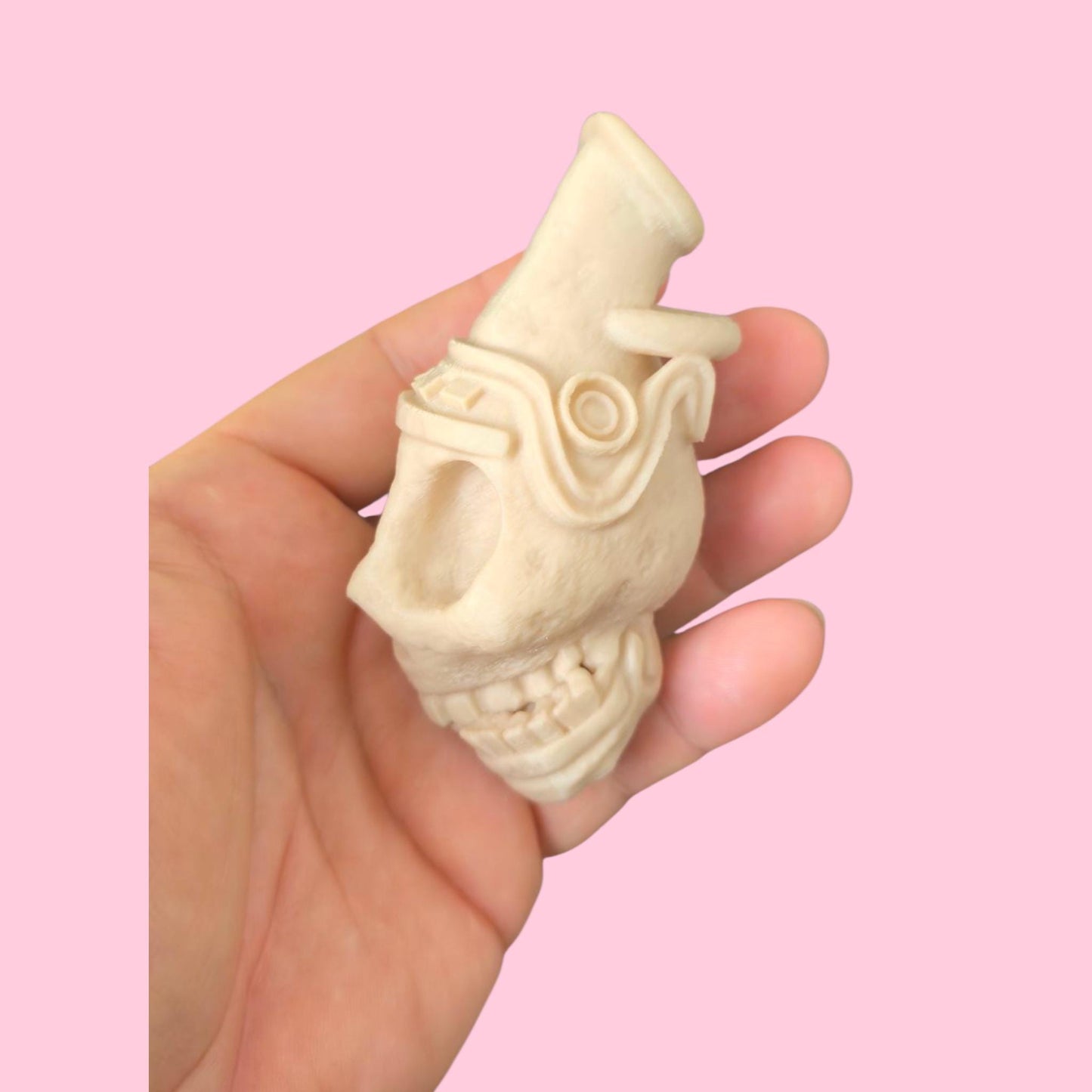 Blow the bone-chilling scream of the ancients. This handcrafted Aztec death whistle delivers a terrifying sound. A unique gift, replica, or tribal decor piece.