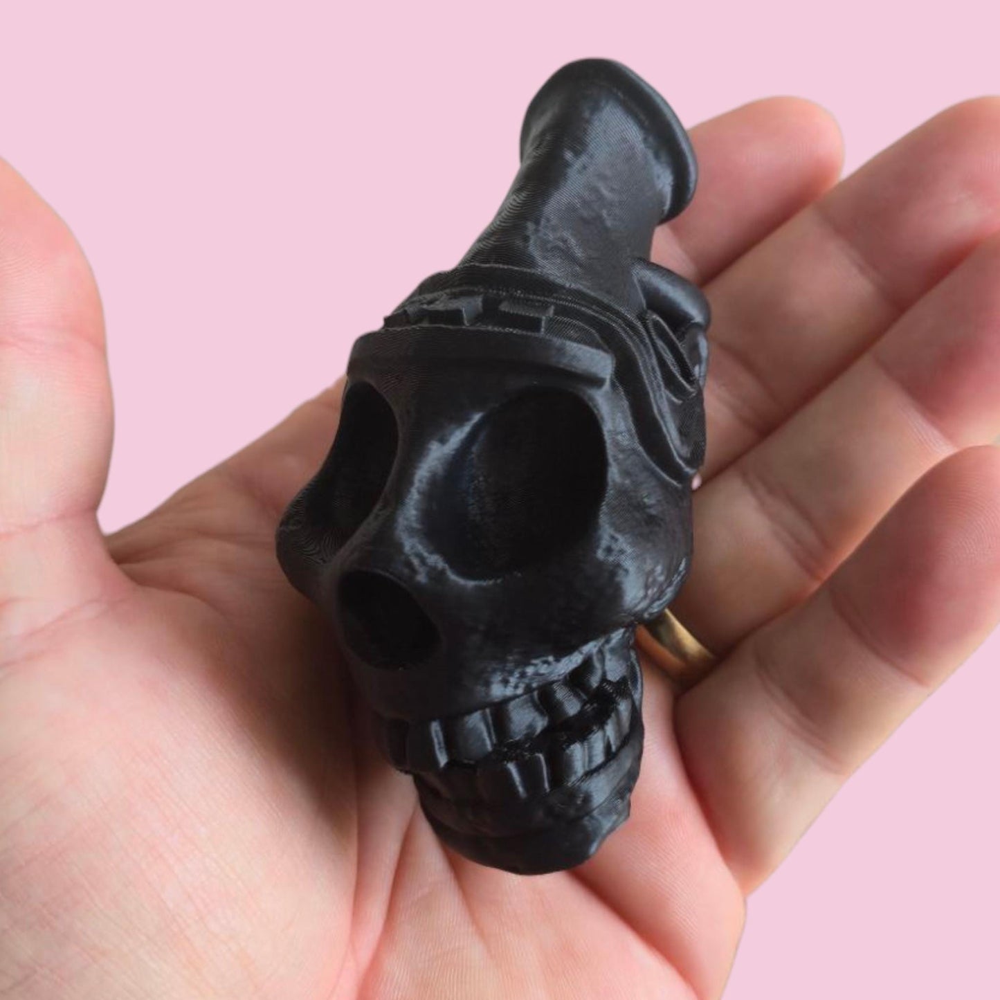 Blow the bone-chilling scream of the ancients. This handcrafted Aztec death whistle delivers a terrifying sound. A unique gift, replica, or tribal decor piece.