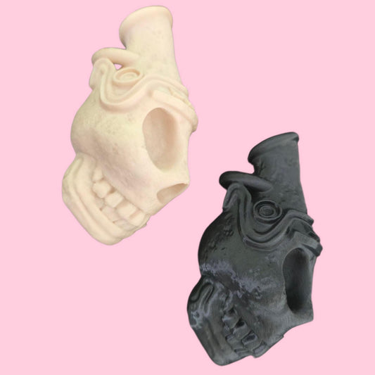 Blow the bone-chilling scream of the ancients. This handcrafted Aztec death whistle delivers a terrifying sound. A unique gift, replica, or tribal decor piece.