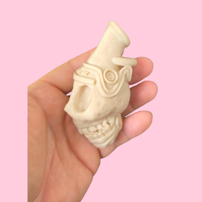 Blow the bone-chilling scream of the ancients. This handcrafted Aztec death whistle delivers a terrifying sound. A unique gift, replica, or tribal decor piece.